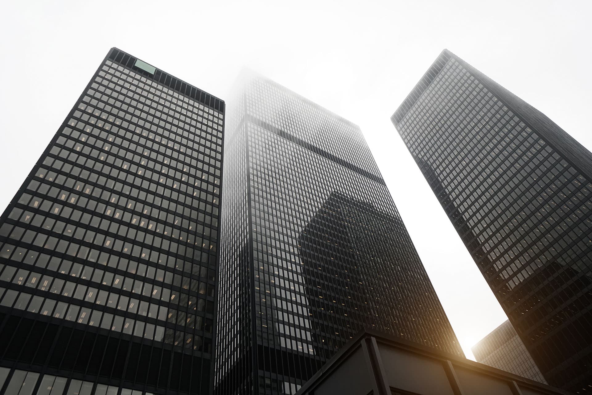 Scenic Toronto financial district skyline and modern architecture. Skyscrapers, fog and clouds concept.